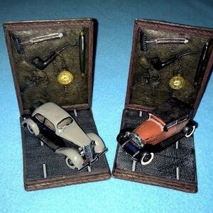 VINTAGE bookends -antique sedans